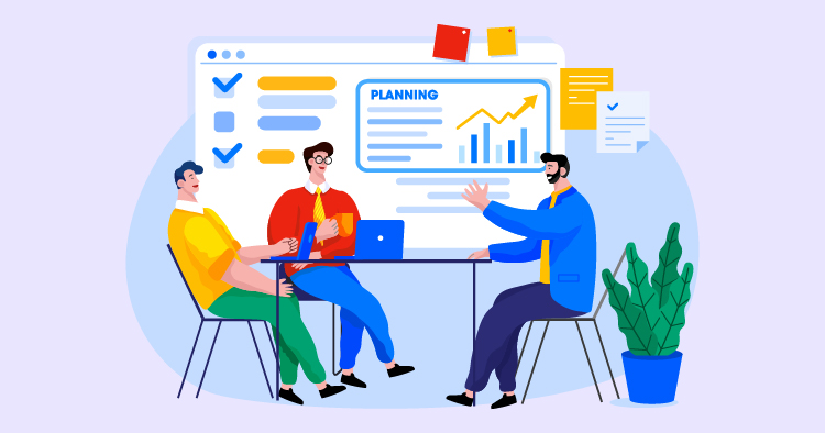 Three diverse professionals engaged in a collaborative meeting around a table, discussing project planning. A digital screen in the background displays graphs and checklists related to business strategies, while a potted plant adds a touch of greenery to the office setting.