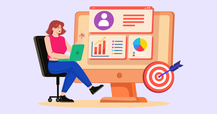 Person working on a laptop in front of a large monitor displaying graphs, charts, and a target symbol, representing data analysis and goal setting in a professional setting.