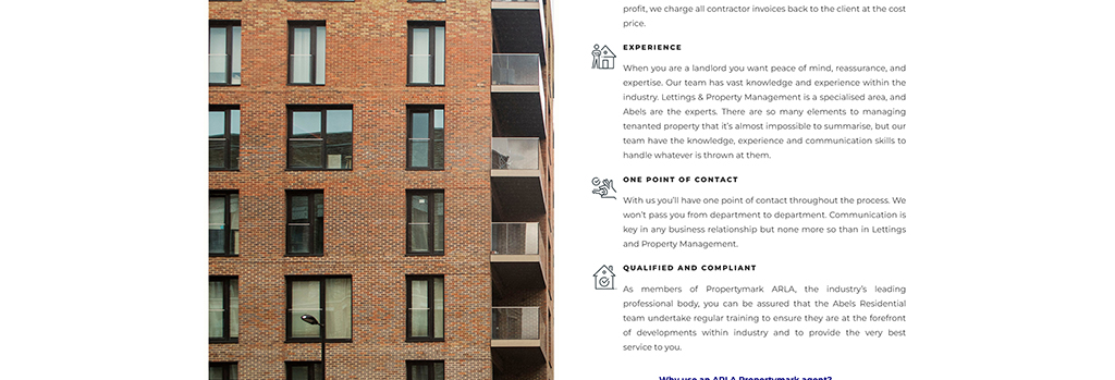 Image of a modern brick apartment building with large windows, highlighting property management services offered by Lettings & Property Management. The design features both traditional and contemporary architectural elements, emphasizing quality living spaces.