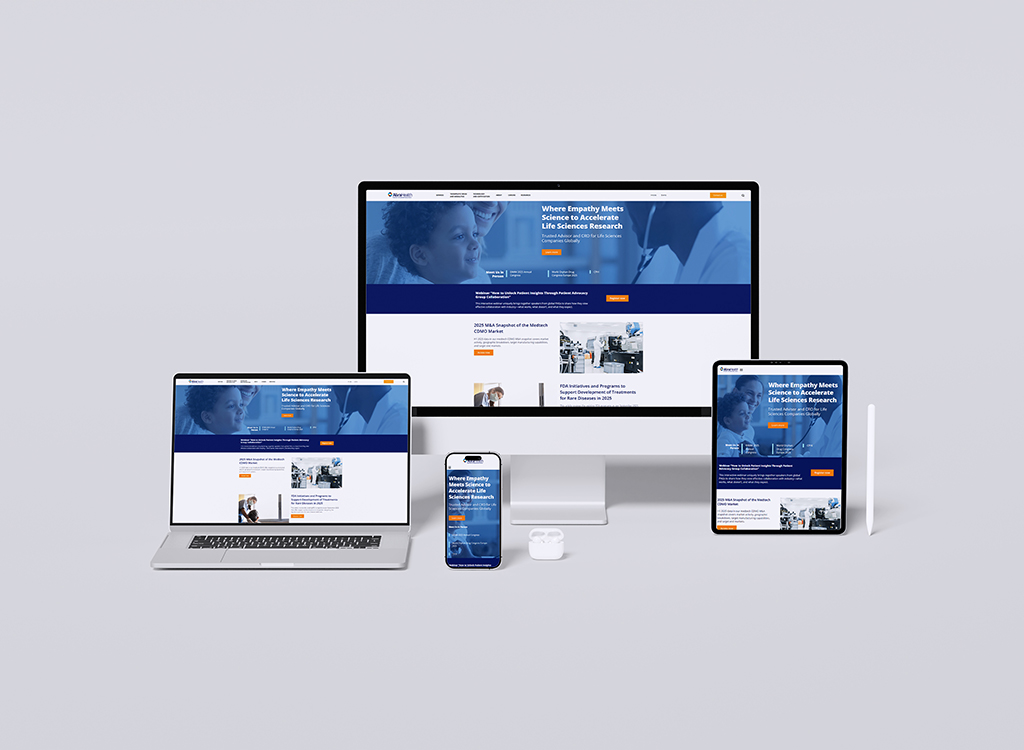 A collection of devices displaying a modern website focused on accelerating life sciences research, featuring a desktop monitor, laptop, tablet, and smartphone, all showcasing the same user-friendly interface and informative content.