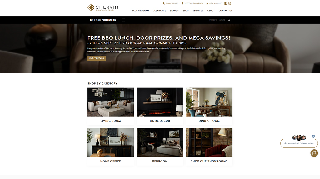 Homepage of Chervin Furniture & Design featuring a promotional banner for a community BBQ event with free lunch and door prizes. The site displays categories for shopping, including living room, home decor, dining room, home office, and bedroom furniture.
