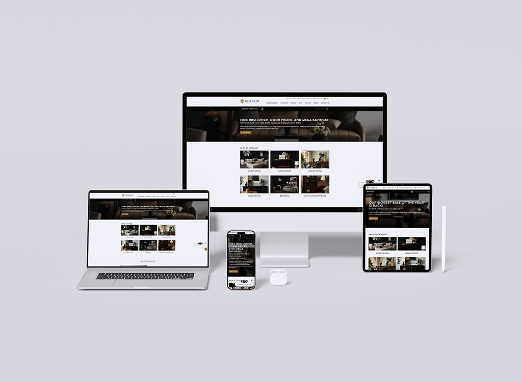 Image showcasing multiple devices including a desktop, laptop, tablet, and smartphone displaying a modern furniture website. The site features categories like living room, dining room, and bedroom with promotional banners for sales and free offers. Ideal for illustrating responsive web design and e-commerce in home furnishings.