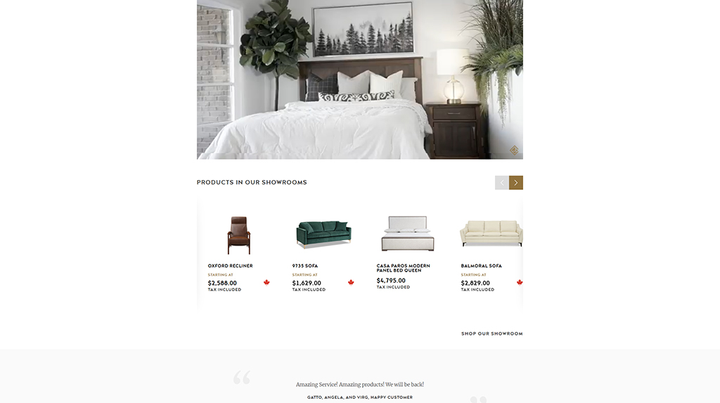 Cozy bedroom featuring a stylish wooden bed frame with decorative pillows, bedside table with a lamp, and lush greenery. Showcasing furniture products available in the showroom, including recliners and sofas.