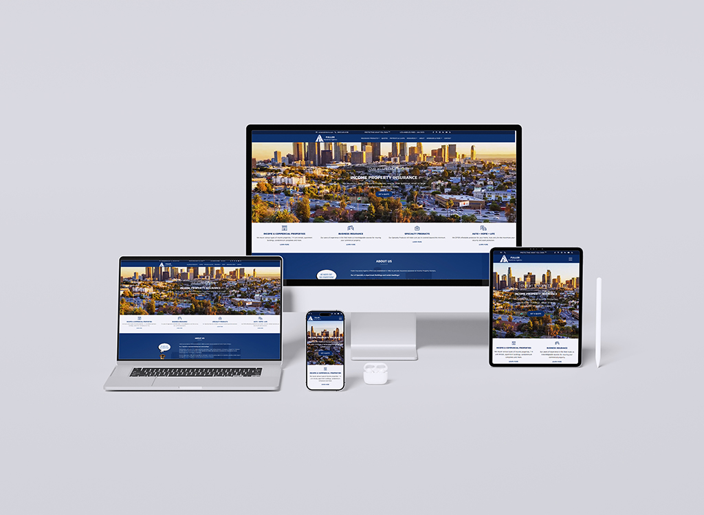 Image showcasing a responsive website design displayed on multiple devices, including a desktop computer, laptop, tablet, and smartphone, featuring a city skyline and various sections related to property insurance and real estate services.