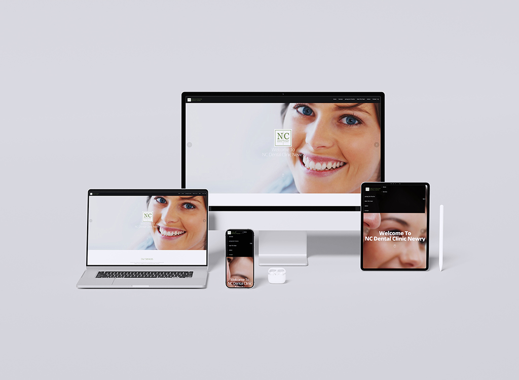 Modern devices displaying the NC Dental Clinic Newry website, featuring a smiling patient. The image includes a desktop monitor, laptop, tablet, and smartphone, highlighting a user-friendly design for dental services.