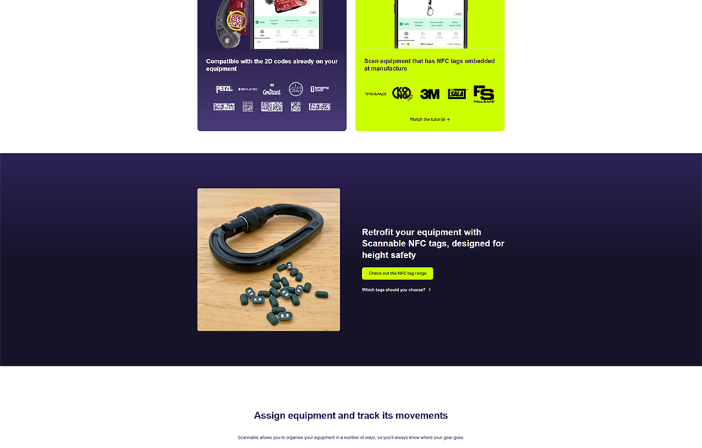 Image of a black carabiner and several small NFC tags on a wooden surface, promoting Scannable NFC tags designed for height safety equipment tracking and management.