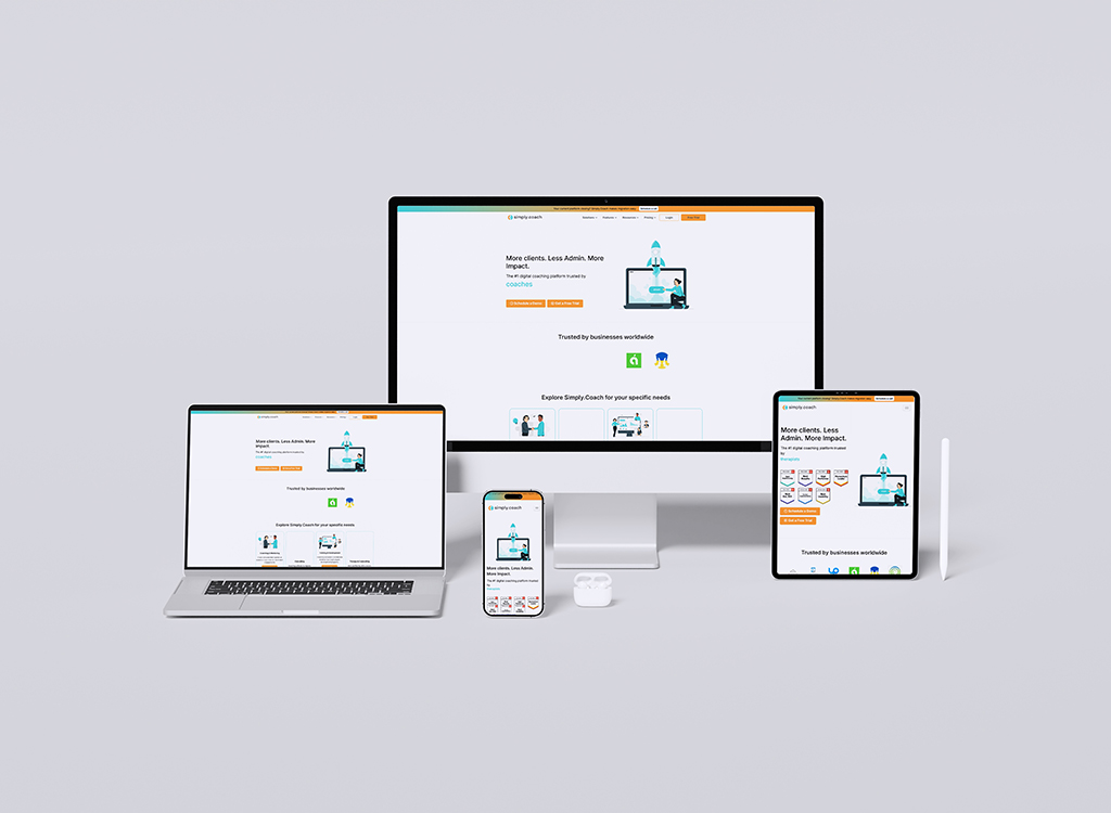 A collection of devices displaying the Simply Coach website, including a desktop monitor, laptop, tablet, and smartphone, showcasing a user-friendly interface designed for coaches and businesses to manage clients effectively.