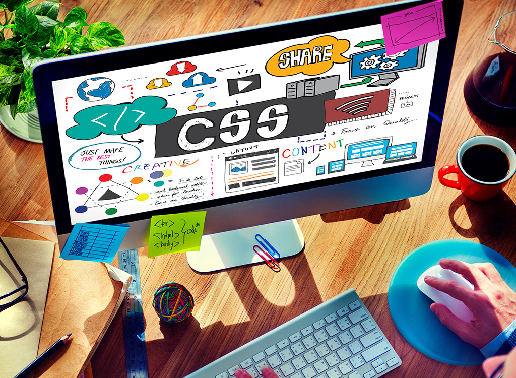 Computer screen displaying web design concepts