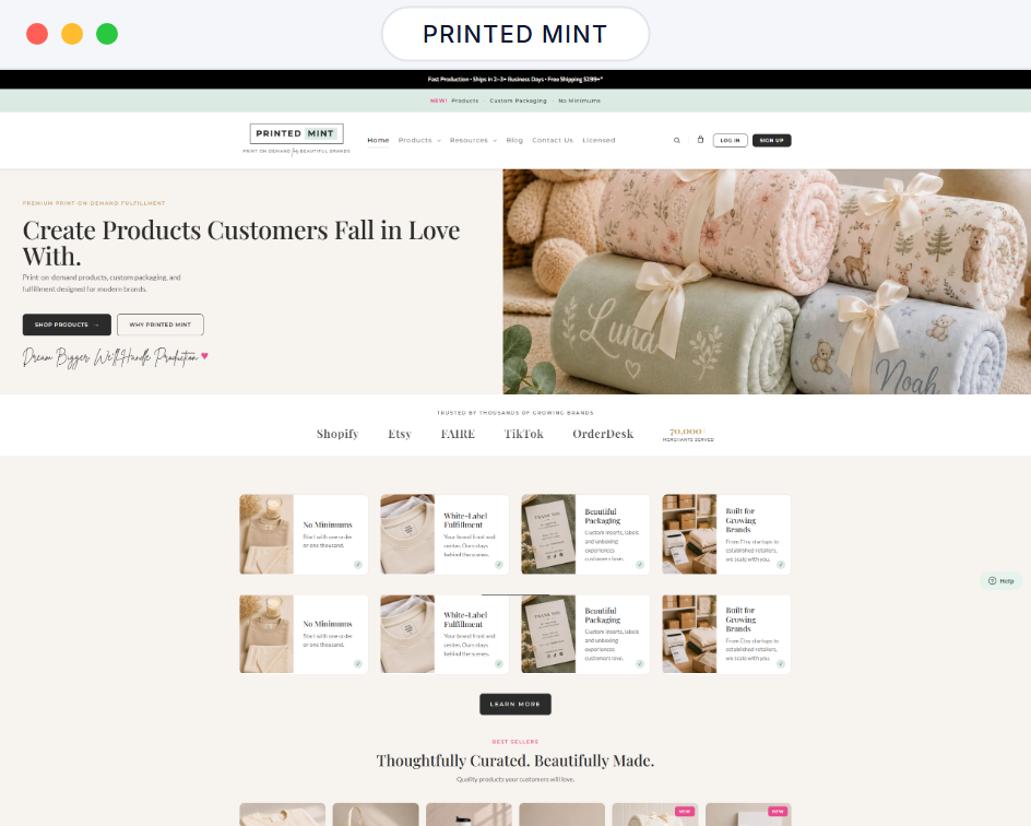 Printed Mint website homepage in a browser window, personalized blankets above its product collections